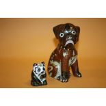 AN ORIENTAL STYLE CLOISONNE FIGURE OF A SEATED DOG, TOGETHER WITH A SMALLER PANDA FIGURE (2) DOG