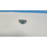 A VINTAGE TURQUOISE AND DIAMOND RING, in unmarked yellow metal, approx. weight 2.2 g