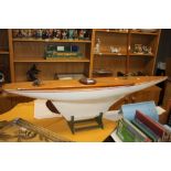 A PART BUILT MODEL OF A SHIP