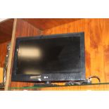 A 26" LG TV AND REMOTE H/C