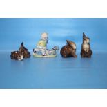 A WADE MABEL LUCIE ATTWELL FIGURE TOGETHER WITH A COLLECTION OF CERAMIC RABBITS, SOME A/F