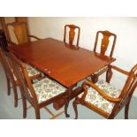 AN OAK DRAW LEAF TABLE AND SIX QUEEN ANNE STYLE CHAIRS INCLUDING TWO CARVERS, ALL GOOD STRONG AND