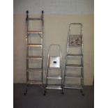 THREE ALUMINIUM STEP LADDERS