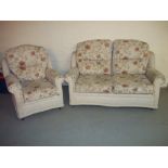 A FABRIC CHENILLE TWO PIECE SUITE COMPRISING TWO SEATER SOFA AND ONE CHAIR