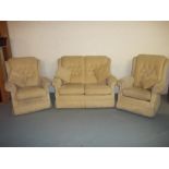 A CREAM THREE PIECE SUITE IN CHENILLE FABRIC COMPRISING TWO SEATER SOFA AND TWO CHAIRS