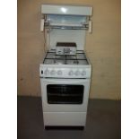 A NEW WORLD GAS COOKER WITH HIGH LEVEL GRILL