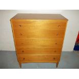 A TEAK FIVE DRAWER BEDROOM CHEST OF DRAWERS