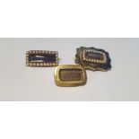 THREE LATE GEORGIAN / EARLY VICTORIAN MOURNING BROOCHES, one engraved "S. J. died Feb 18th 1836 aged