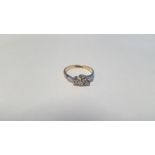 A 9 CT GOLD AND PLATINUM THREE STONE DIAMOND RING, Approx weight 2.2 g