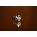 AN 18CT WHITE GOLD MARQUISE CUT DIAMOND CLUSTER RING, SIZE K 1/2, APPROX 4g