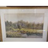 A LARGE FRAMED & GLAZED WATERCOLOUR OF COUNTRY RIVER ALONGSIDE CASTLE RUINS