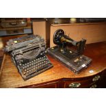 A VINTAGE UNDERWOOD TYPEWRITER AND A SINGER SEWING MACHINE (2) A/F