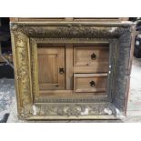 A LARGE ANTIQUE GILT PICTURE FRAME AF