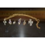 SEVEN ASSORTED 9CT PENDANTS PLUS A CROSS - WEIGHT 28.4 GRAM APPROX