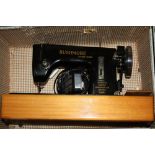 A VINTAGE RUSHMORE SEWING MACHINE