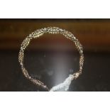 A 9CT GOLD AND DIAMOND BRACELET - WEIGHT 5.42 GRAMS APPROX