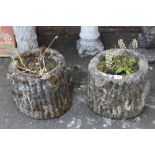 A PAIR OF LOG EFFECT STONE PLANTERS