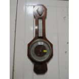 AN ART DECO STYLE OAK WALL BAROMETER