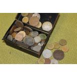 A TIN OF ASSORTED VINTAGE TOKENS, COINS ETC