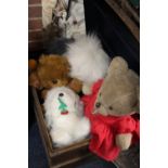 A VINTAGE TIN TRUNK CONTAINING A QUANTITY OF VINTAGE AND MODERN SOFT TOYS