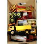 A BOX OF BRITAINS DIE CAST FARM TOYS TO INCLUDE A COMBINE HARVESTER, TRACTOR ETC.