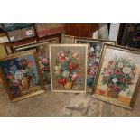 A COLLECTION OF GILT FRAMED AND GLAZED NEEDLEWORKS OF FLOWERS IN VASES (6)