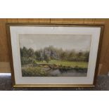 A LARGE FRAMED & GLAZED WATERCOLOUR OF COUNTRY RIVER ALONGSIDE CASTLE RUINS