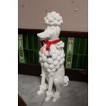 A MODERN RETRO STYLE RESIN FIGURE OF A SEATED POODLE H - 62CM