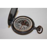 AN ANTIQUE MILITARY STYLE COMPASS