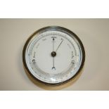 A BRASS CIRCULAR BAROMETER, Dia 12.25 cm