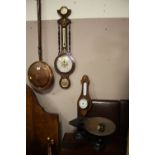 A COPPER WARMING PAN WITH A SET OF SCALES AND WEIGHTS AND A MODERN CLOCK BAROMETER WITH ANOTHER