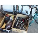 TWO BOXES OF BICYCLE PARTS ETC PLUS TWO BIKE RACKS