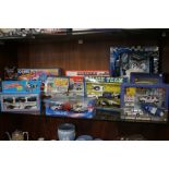 A COLLECTION OF BOXED MODEL POLICE EMEREGENCY VEHICLES ETC.