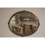 A DECO STYLE OVAL MIRROR 56 X 46 CM