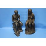 TWO CLAY SEATED FIGURES, MALE AND FEMALE
