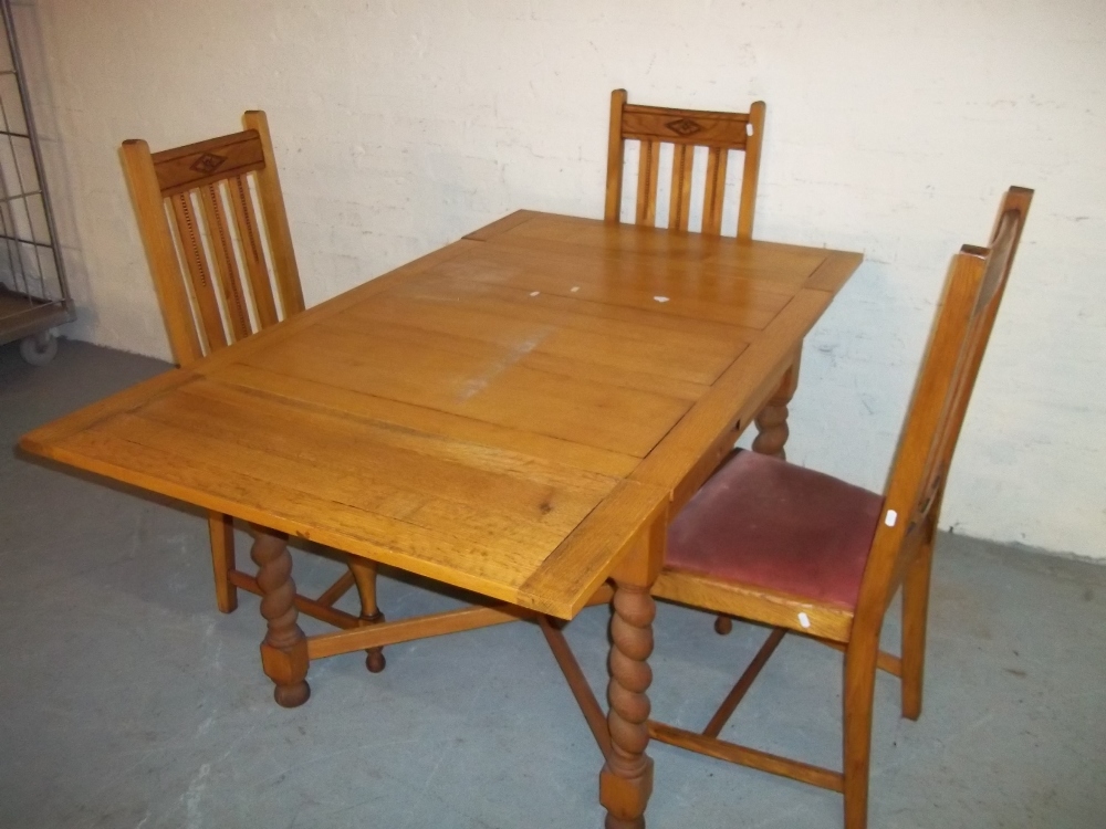 AN OAK DRAWER LEAF TABLE AND THREE CHAIRS - Image 2 of 3