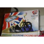 A BOXED SCALEXTRIC CYCLING VELODROME SET TOGETHER WITH DAYS GONE COMMONWEALTH GAMES VEHICLES ETC.