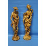 A PAIR OF ORIENTAL STYLE RESIN FIGURES