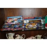 A QUANTITY OF BOXED MODEL HELICOPTERS, EMERGENCY VEHICLES ETC.