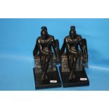 A PAIR OF METAL BOOKENDS