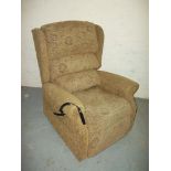 A FABRIC RISE RECLINER CHAIR