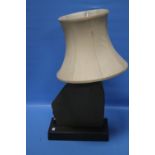 A HEAVY BASED TABLE LAMP