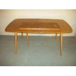 AN EXTENDING ERCOL DINING TABLE