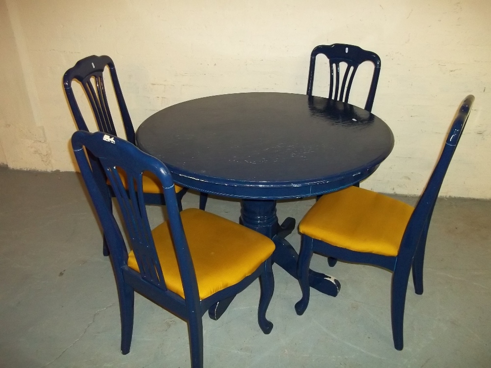 A BLUE DINING TABLE AND FOUR CHAIRS