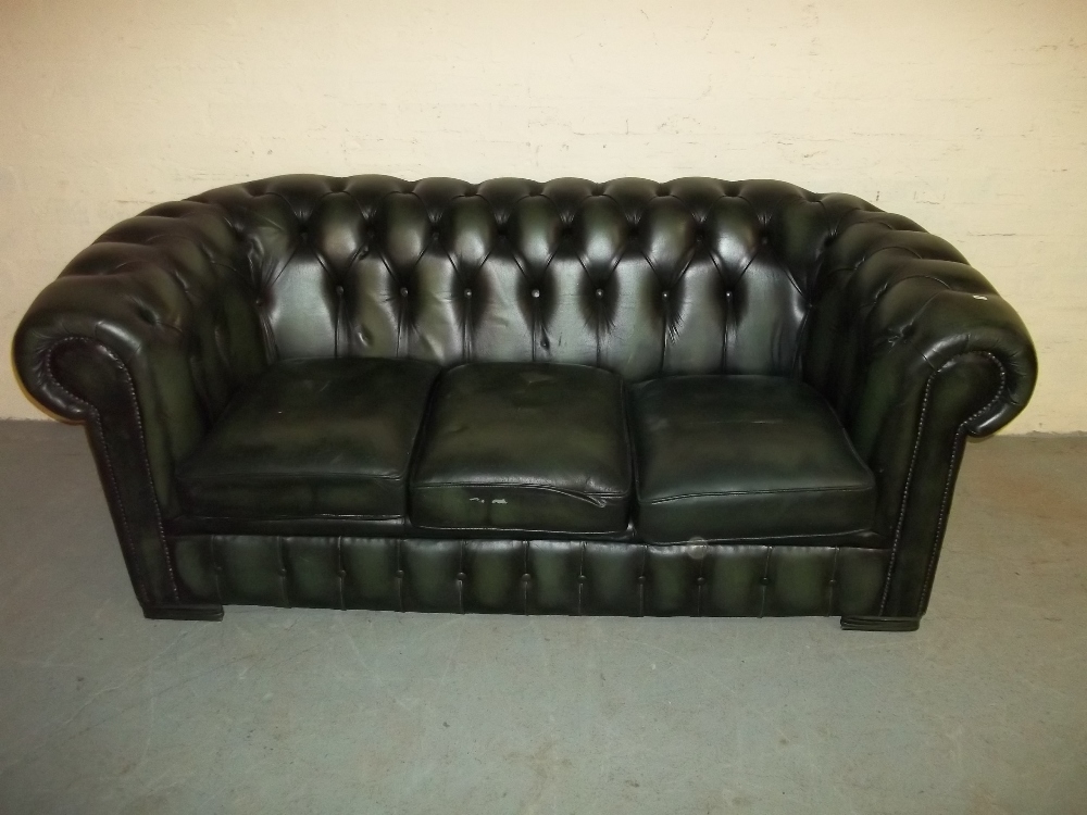 A LEATHER CHESTERFIELD THREE SEATER SOFA