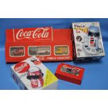 A COCA COLA BREAK DANCER'S CAN, A DIET PEPSI MOVIN' GROOVIN' CAN AND BOXED COCA COLA VEHICLES