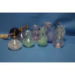 A QUANTITY OF COLOURED GLASS JARS AND PERFUME BOTTLES TO INCLUDE CAITHNESS