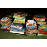 A LARGE QUANTITY OF VINTAGE JIGSAWS, BOXED GAMES ETC.