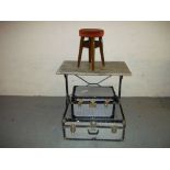 A MARBLE TABLE WITH CAST IRON LEGS, PUB STOOL AND TWO STORAGE CASES