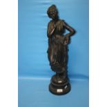 A LARGE BRONZED METAL CLASSICAL FIGURINE